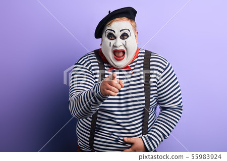 funny clown showing with index finger to the camera funny clown showing with index finger to the camera 55983924