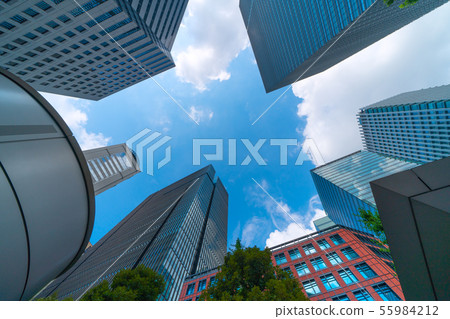 Tokyo cityscape in Japan, renewal of Tokyo / Otemachi office area (the cylinder on the left is the elevator of Tokyo Metro Otemachi Station) 55984212