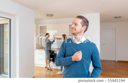 Man being satisfied with the new apartment he wants to buy Man being satisfied with the new apartment he wants to buy 55985194
