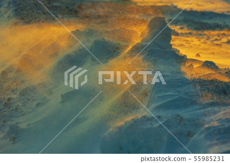 Winter. Colorful sun rays on snowy mountains Winter. Colorful sun rays on snowy mountains 55985231