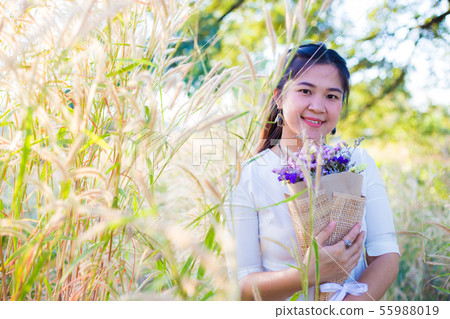 Beautiful fashion women in tree forest sunset 55988019