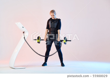 serious girl is going to lift the barbell serious girl is going to lift the barbell 55988029