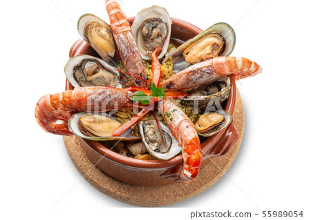 Braised prawns with oysters in a clay pot. Portuguese Algarve cuisine. 55989054
