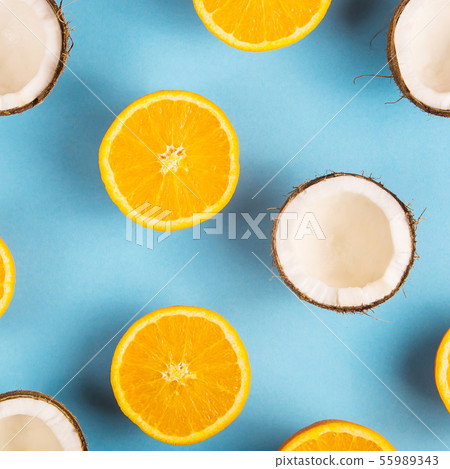 Bright tropical fruits on a blue background Bright tropical fruits on a blue background 55989343