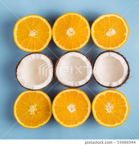 Bright tropical fruits on a blue background Bright tropical fruits on a blue background 55989344