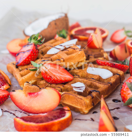 Waffles with strawberries, coconut, plum  55989411