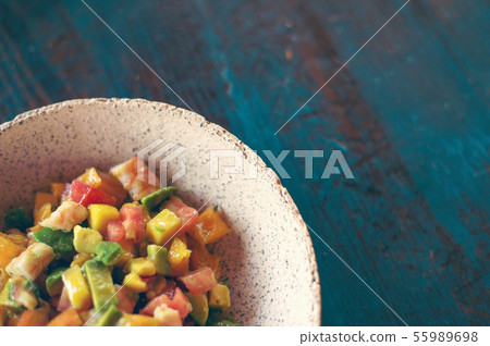 Delicious fruits salad in plate on table close-up 55989698