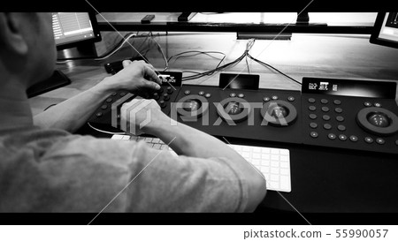 Behind of telecine controller machine and colorist 55990057