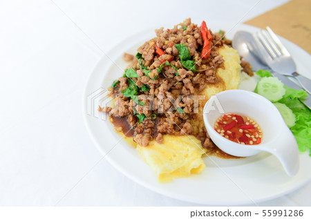 Fried basil with pork on an omelette and Fish Fried basil with pork on an omelette and Fish 55991286