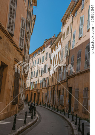 Alley with buildings in Aix-en-Provence Alley with buildings in Aix-en-Provence 55993044