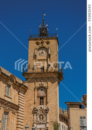 Clock tower with blue sky in Aix-en-Provence Clock tower with blue sky in Aix-en-Provence 55993045