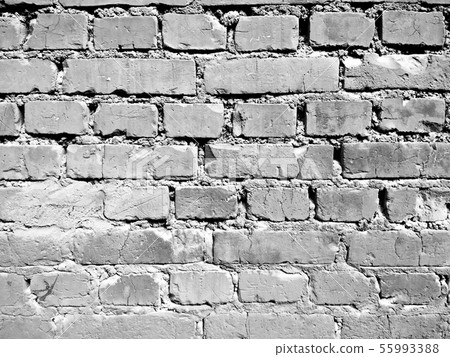 Black and white ruined brick wall photo background Black and white ruined brick wall photo background 55993388