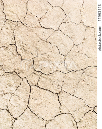 Dried cracked earth soil ground texture background Dried cracked earth soil ground texture background 55993528