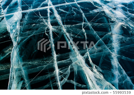 Cracked ice close up. Patterns of winter Baikal. 55993539
