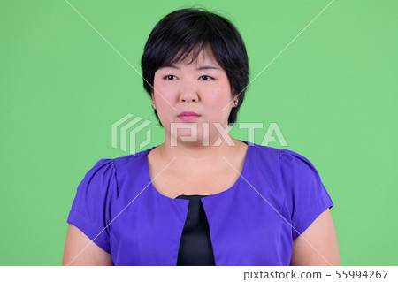 Face of young beautiful overweight Asian woman thinking 55994267