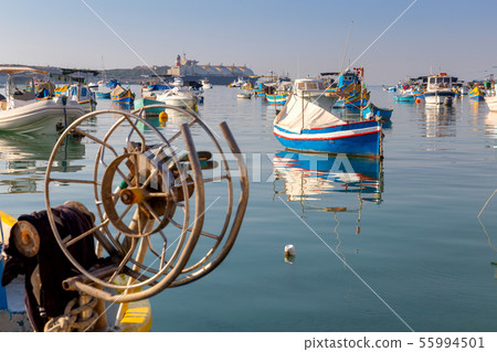 Marsaxlokk. Traditional boats Luzzu in the old harbor. 55994501