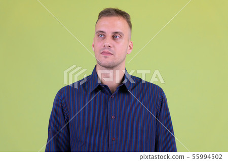 Face of handsome businessman thinking and looking up Face of handsome businessman thinking and looking up 55994502
