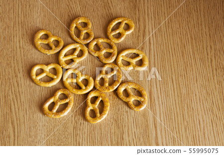 salt pretzel natural wooden background  55995075