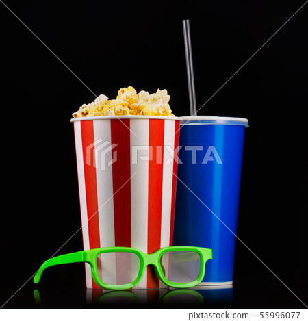 Paper striped bucket with popcorn, cup of drink and glasses isolated on black 55996077