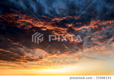 Dark thunderclouds with reflections of sunset Dark thunderclouds with reflections of sunset 55996143