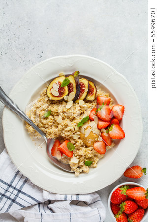 Quinoa breakfast porridge with strawberries Quinoa breakfast porridge with strawberries 55996701