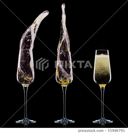 Set of luxury champagne glasses isolated on a black background Set of luxury champagne glasses isolated on a black background 55996791