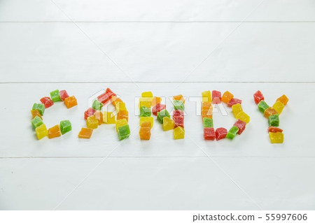 Word candy written with dried pineapples Word candy written with dried pineapples 55997606