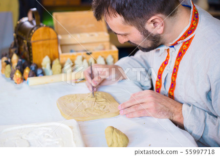 Potter making clay stamp picture Potter making clay stamp picture 55997718
