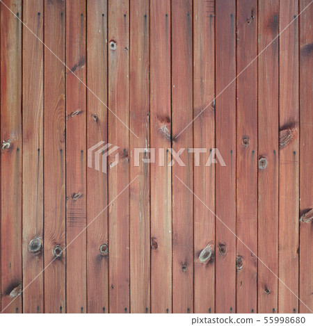 Close up of brown wooden fence panels. Many Close up of brown wooden fence panels. Many 55998680