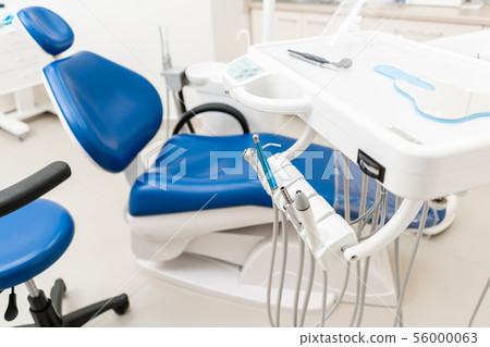 Close-up dental high speed turbine. Dental work in clinic. Operation, tooth replacement. Medicine 56000063