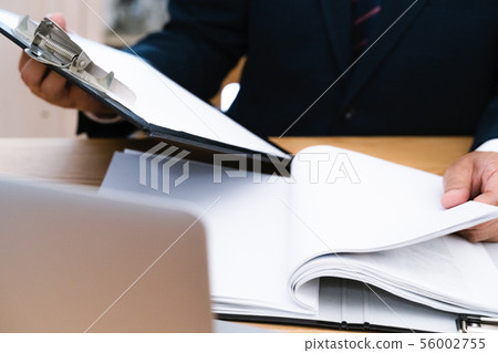 Documents and businessmen 56002755