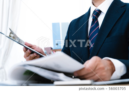 Documents and businessmen Documents and businessmen 56003705
