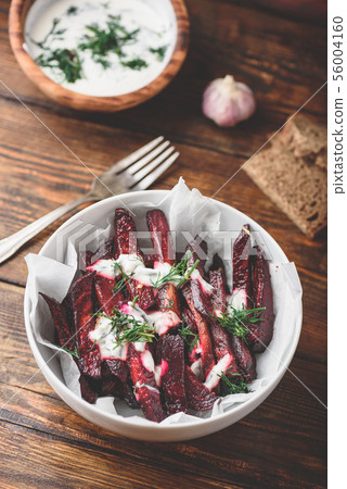 Baked beet fries with greek yogurt and dill Baked beet fries with greek yogurt and dill 56004160