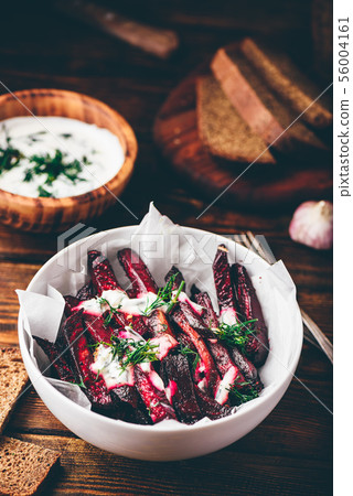 Oven baked beet fries with greek yogurt and dill 56004161