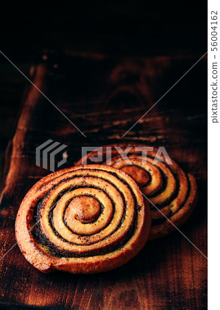 Sweet roll with poppy seeds Sweet roll with poppy seeds 56004162