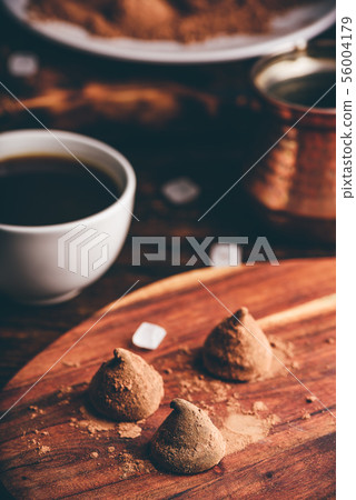Homemade chocolate truffles coated in cocoa powder Homemade chocolate truffles coated in cocoa powder 56004179