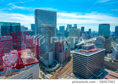 Ferris wheel and cityscape of downtown Osaka 56007062