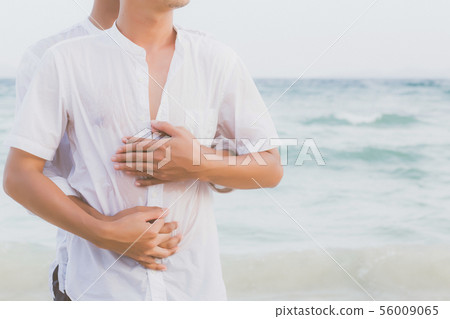 Homosexual portrait young asian couple on beach Homosexual portrait young asian couple on beach 56009065