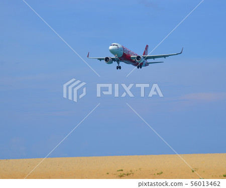 Airplane landing at Phuket Airport Airplane landing at Phuket Airport 56013462