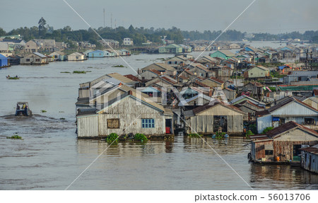 Mekong River with floating village 56013706