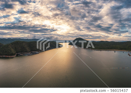 Scenery of Srinagarind dam in valley at sunset 56015437