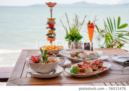 Variety of food, roasted pork ribs, beef steak, Variety of food, roasted pork ribs, beef steak, 56015476