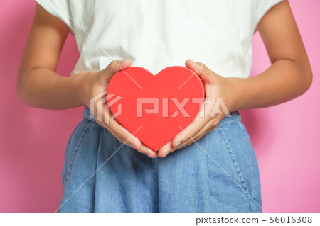 Woman with heart 56016308