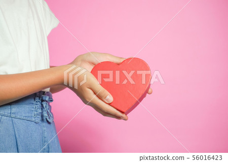 Woman with heart Woman with heart 56016423