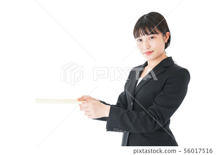Business woman in suit submitting documents Business woman in suit submitting documents 56017516