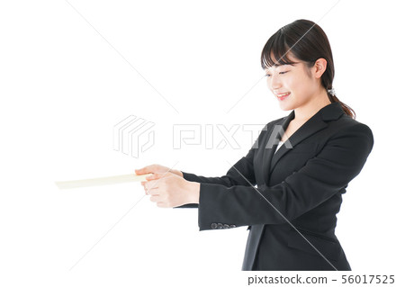 Business woman in suit submitting documents Business woman in suit submitting documents 56017525