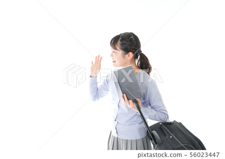 A young woman who travels alone with a guide A young woman who travels alone with a guide 56023447