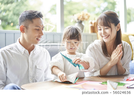 Girl making origami 56024636