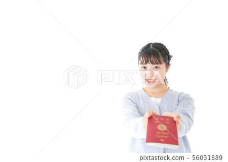 Young woman with passport 56031889