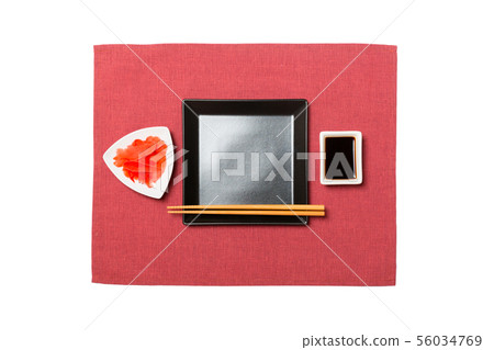 Empty black square plate with chopsticks for 56034769